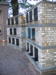 prefab urnenmuur zandstraal structuur antraciet gekleurd beton 